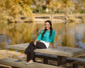 Photo of Paul Pant sitting at a bench